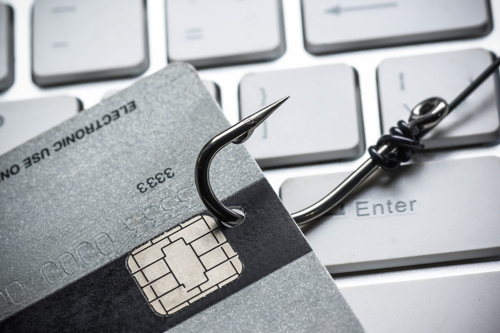 Imagine reprezentând fraude comune cu transferuri de bani, ilustrând o încercare de phishing.